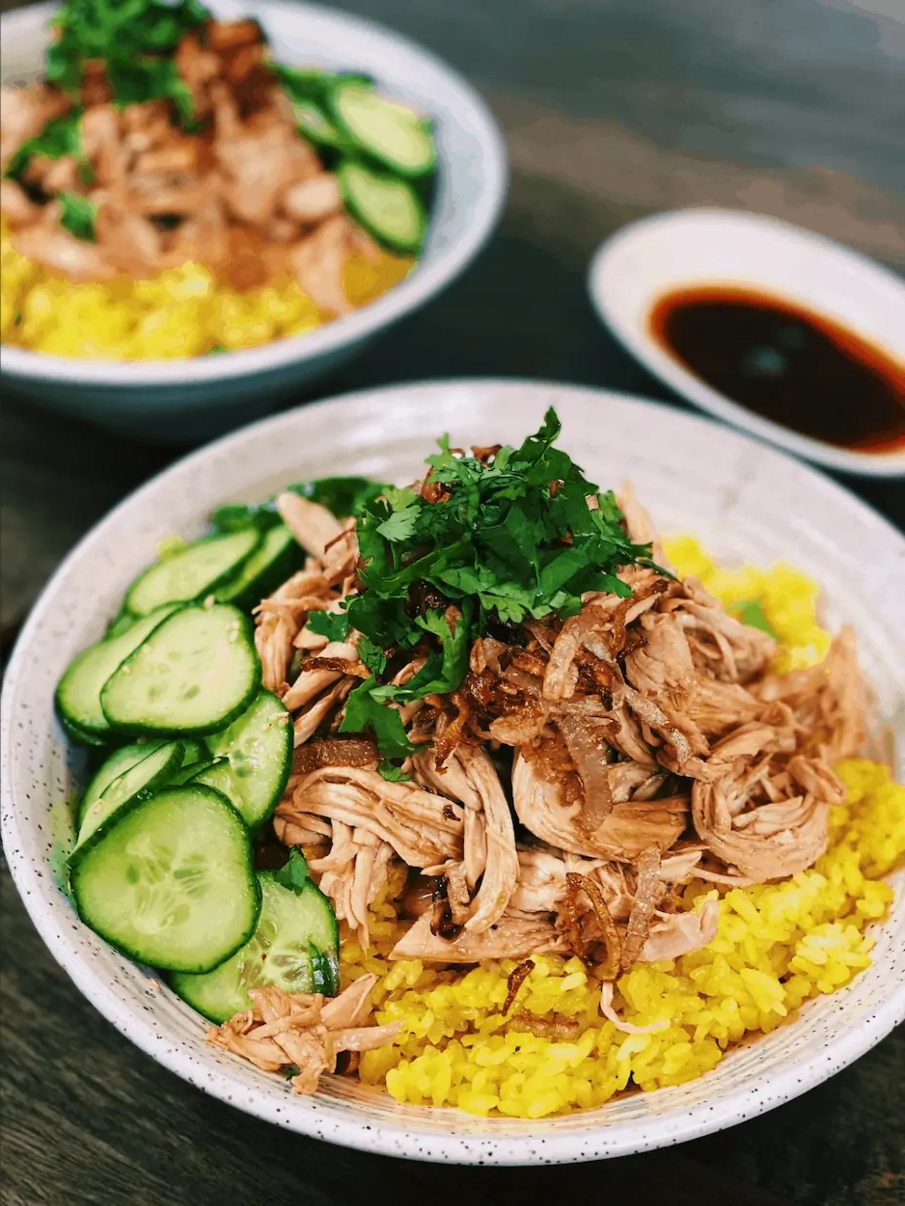 a couple of bbq pulled chicken rice bowls