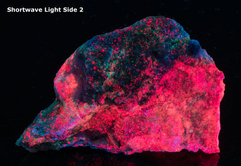 red and pink fluorescing tugtupite piece