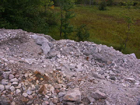 a dump area with boulders