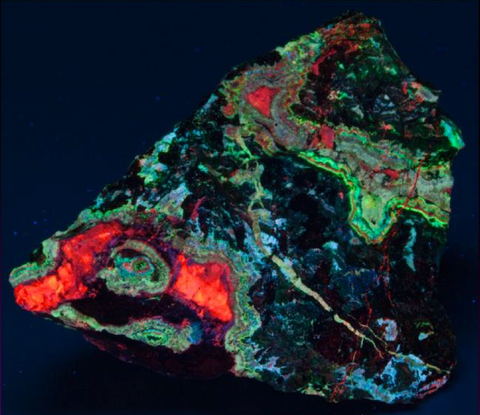 A bright fluorescent mineral of calcite and willemite