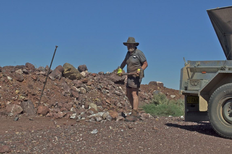 a man mining for rocks in australia