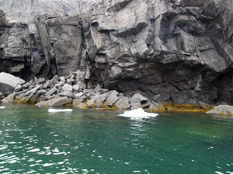 shoreline of boudlers at ilimaussaq complex in Greenland