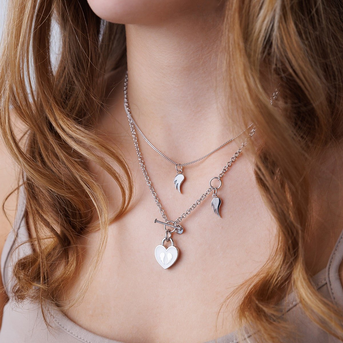 Steff Silver & White Enamel Guardian Angel Wings Lovelock Necklace from Steffans Jewellers.