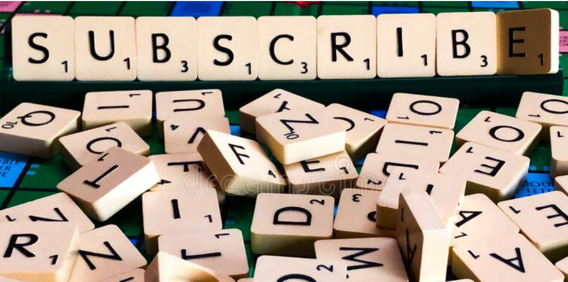 Scrabble letters spelling out the word 'Subscribe'