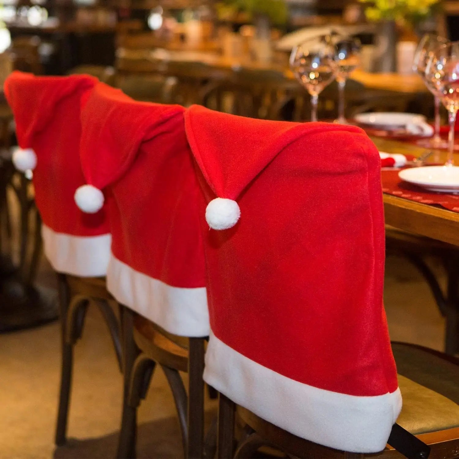 Festive Santa Hat Chair Covers for Christmas Décor - Image 19