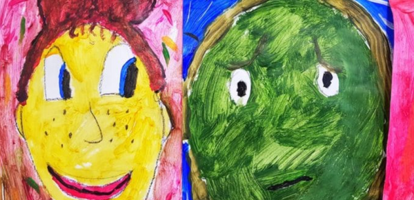 One piece of children's art features a yellow face, red hair, blue eyes, and freckles on a pink confetti strewn background. Another large face is green with brown hair and a blue background.