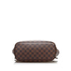 Louis Vuitton District beggars bag in monogram canvas and natural leather