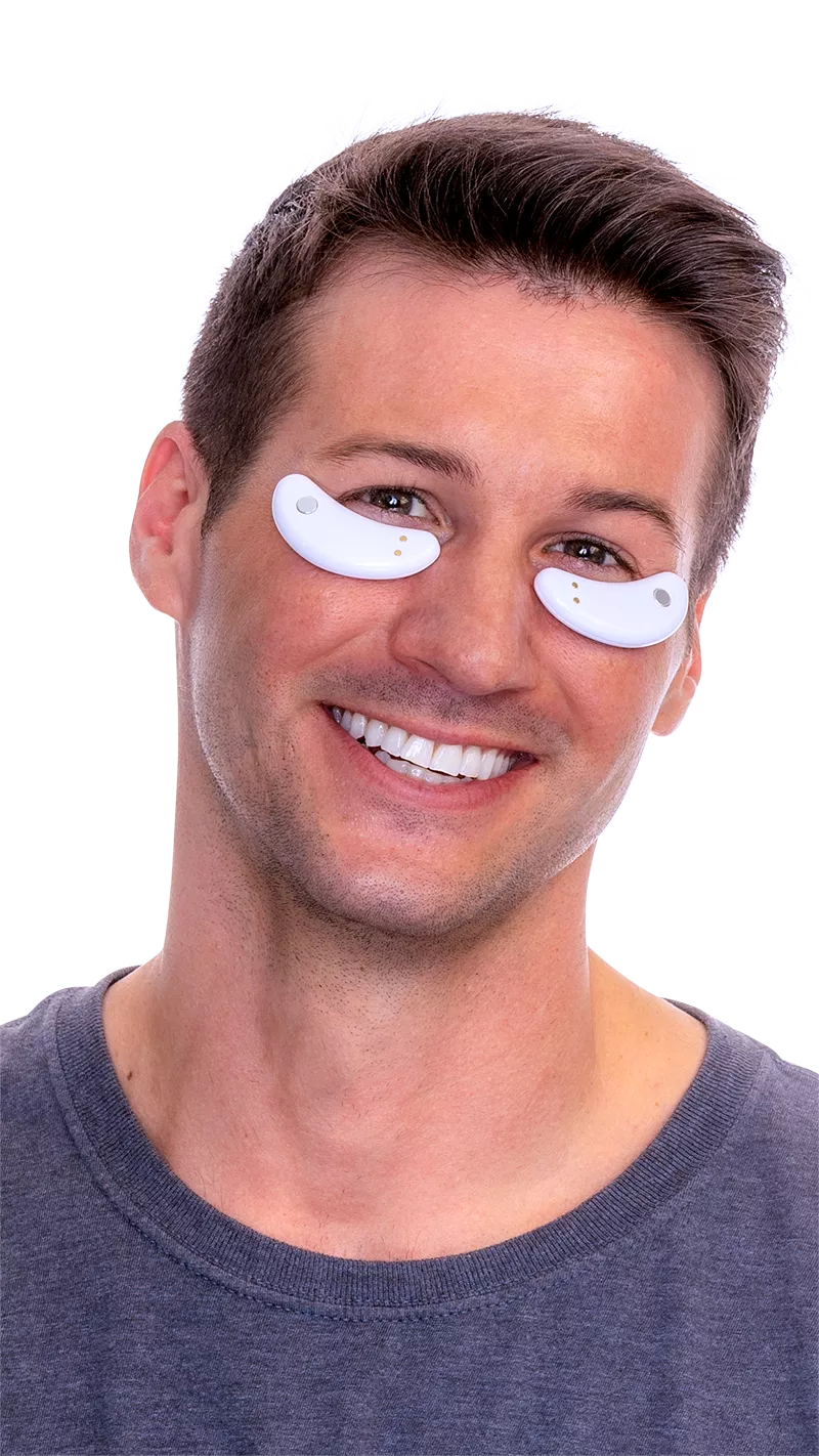 Man utilizing EyePods under eye patches for dark circle and puffy eyes treatment