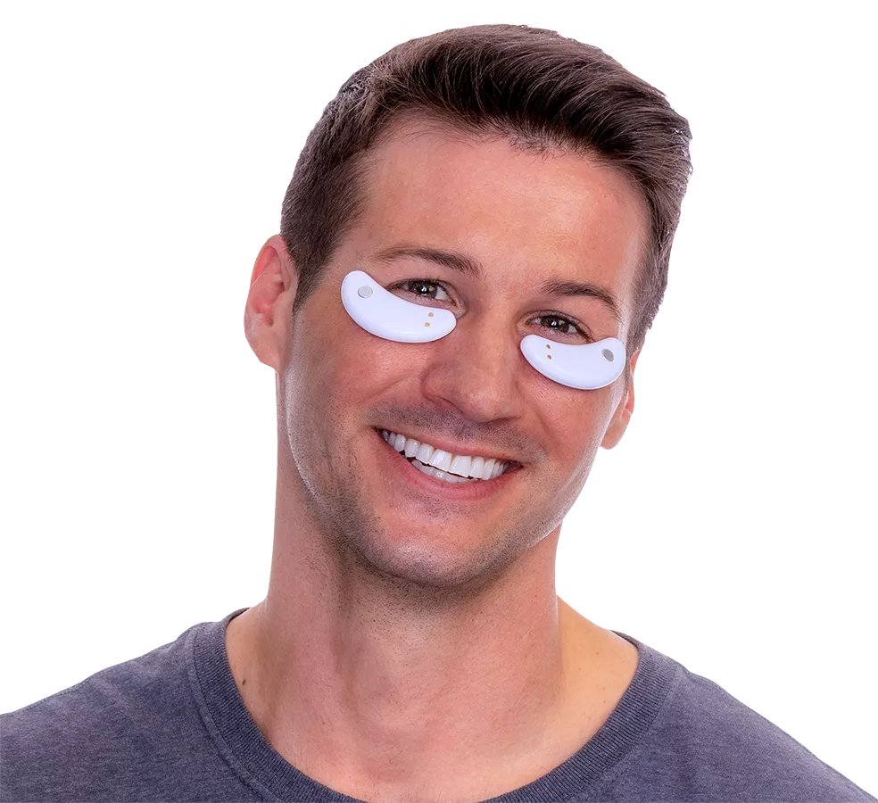 Man utilizing EyePods under eye patches for dark circle and puffy eyes treatment