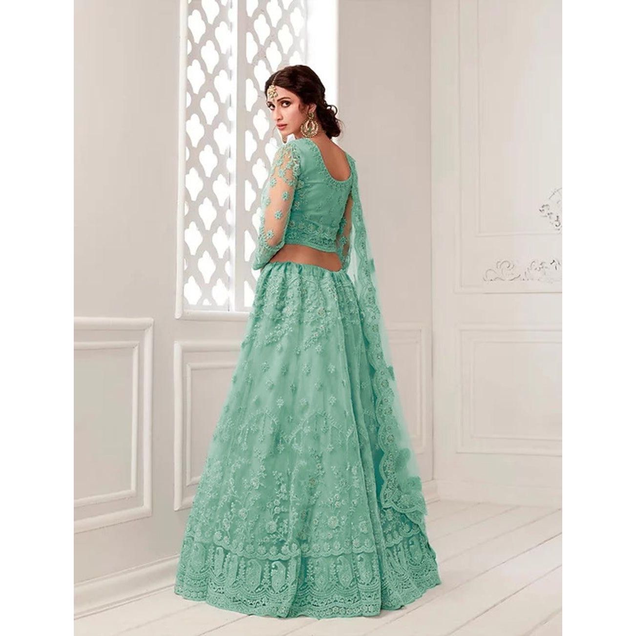 Enthralling dark rama green thread and sequins embroidered party wear  lehenga choli