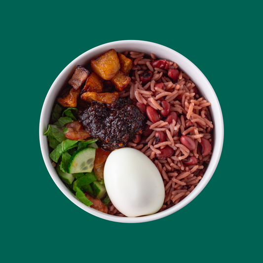 Jollof Peacock rice with beef, boiled egg and shito sauce Peacock® Rice