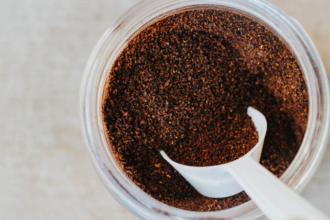 Cooking with coffee grounds. A jar with coffee grounds.