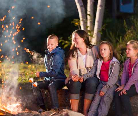 Family roasting marshmellows.