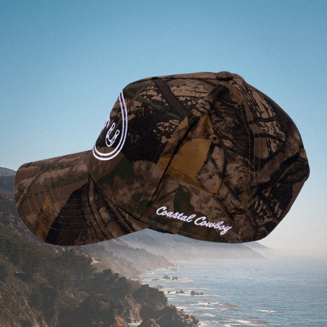 Cowgirl themed camo trucker hat