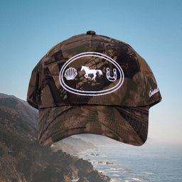 Cowgirl themed camo trucker hat 