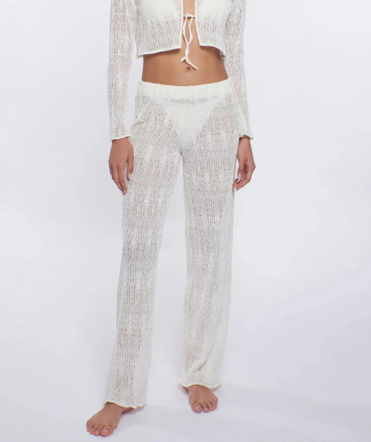 Sheer ivory coverup pants with elastic waistband