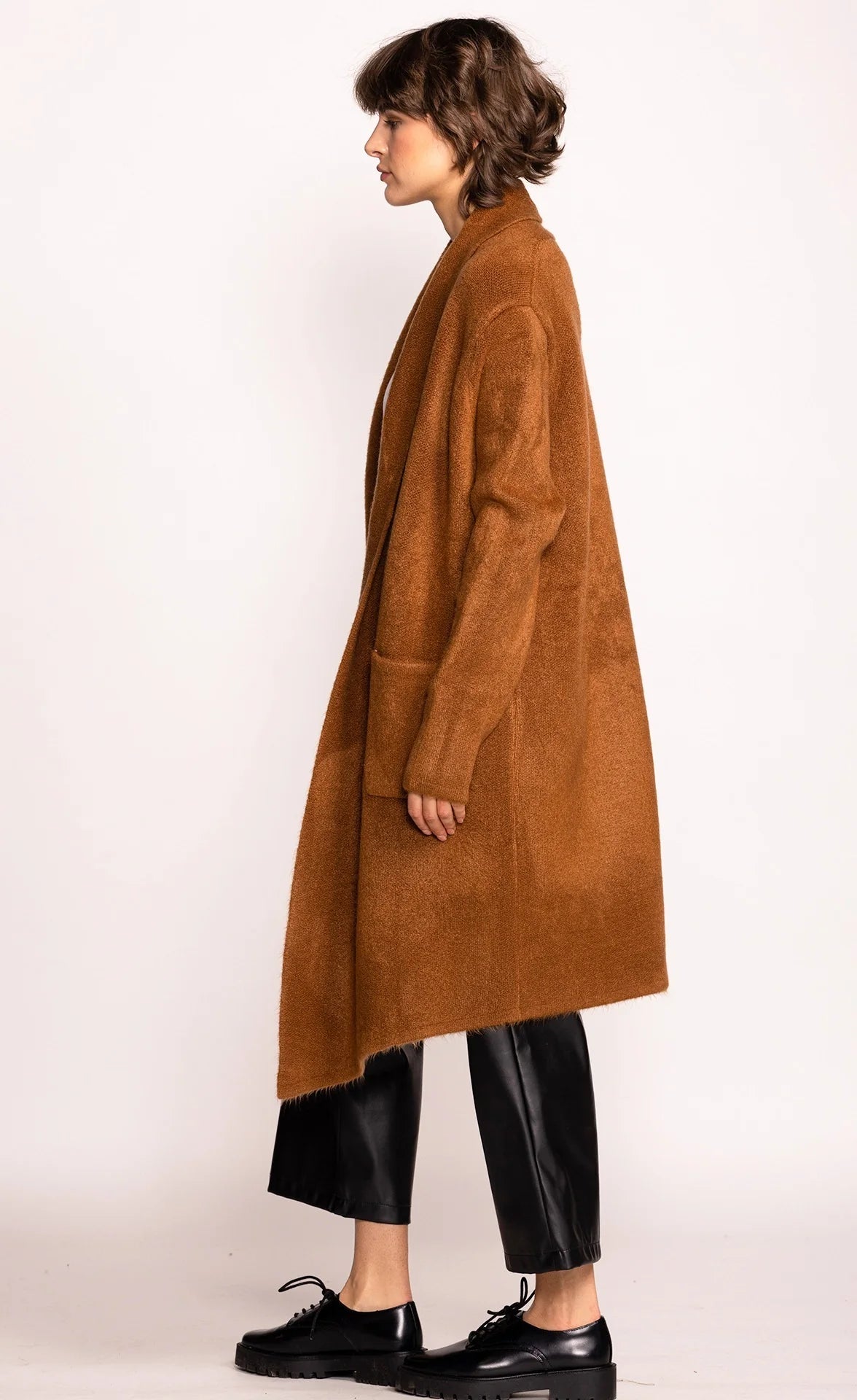 Long brown winter jacket with front pockets