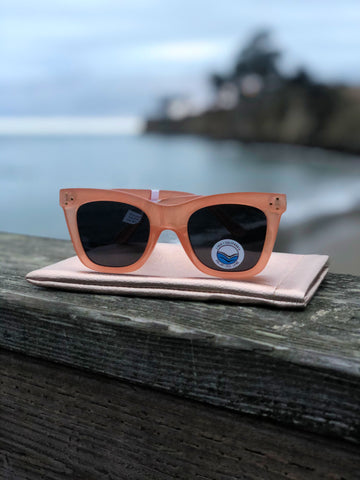 Peach colored sunglasses 