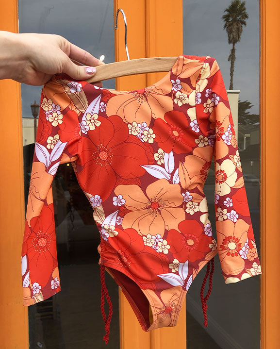 orange flower print long sleeve kids swimsuit 