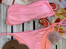 Pink bandeau top and bottoms