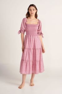 Pink maxi dress with smocked top and puff sleeves