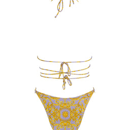 light purple bikini bottoms with gold sun print design and strappy wrap bikini top