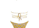 light purple bikini bottoms with gold sun print design and strappy wrap bikini top