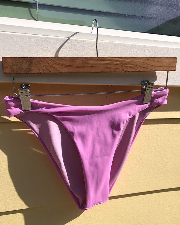 pink low rise bikini bottoms