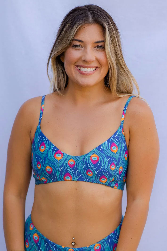 blue, orange, and red peacock pattern bikini