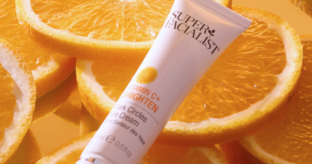 super facialist vitamin c eye cream on oranges