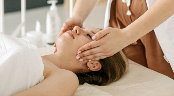 Woman receiving professional facial