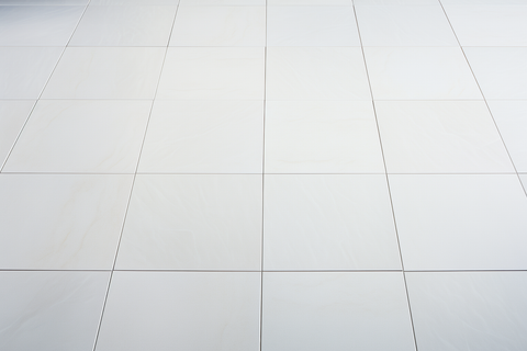 white porcelain square tiles with non-sanded grout  