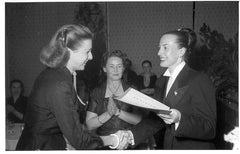 Madame Spillmann in 1950s receiving recognition as a pioneering businesswoman