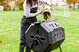 Woman adding food to a black compost bin