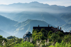 Image of mountains of Taiwan with green forests and cloudy background