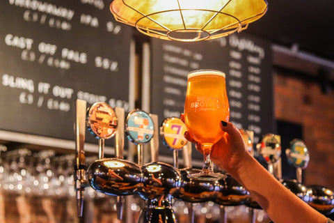 A pint glass in our Ancoats beerhouse