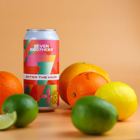 A can of Enter The Haze with fruit surrounding it.