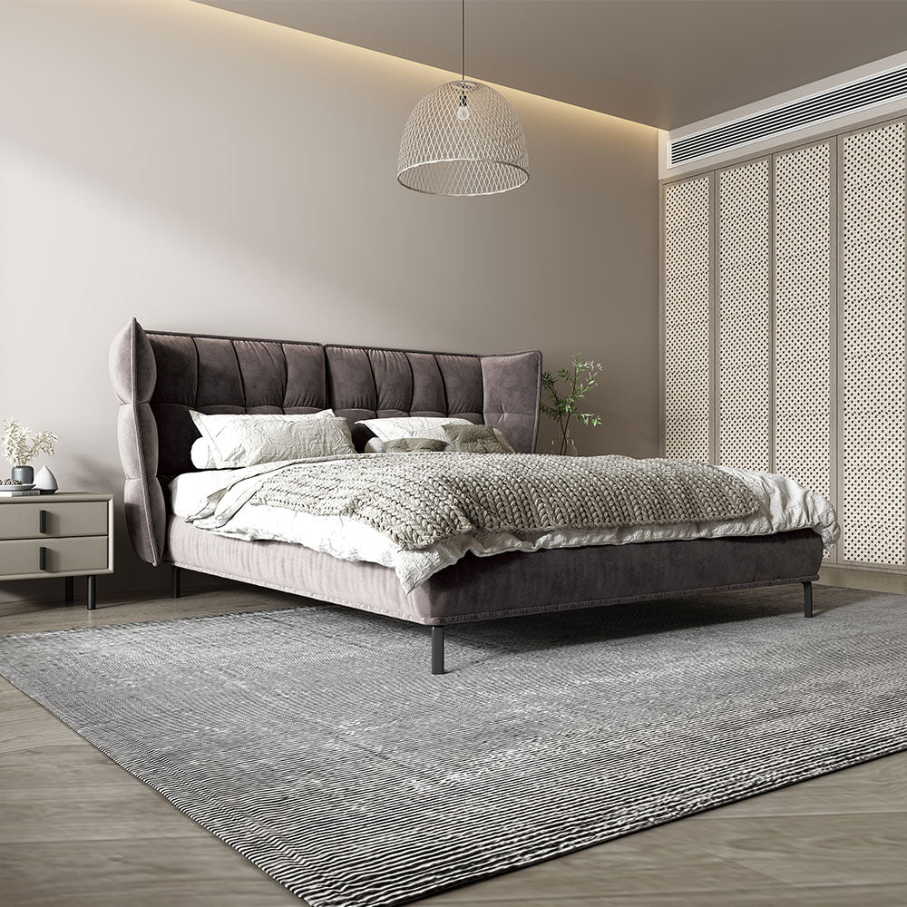 tufted upholstered bed