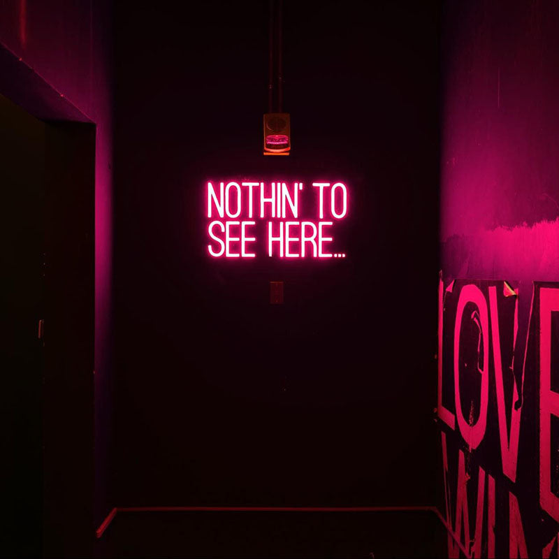 nothing to see here neon sign