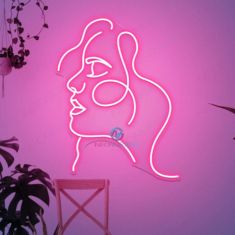 woman face neon sign pink