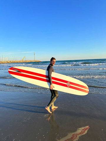 Alberto Bof on the beach with a surf table