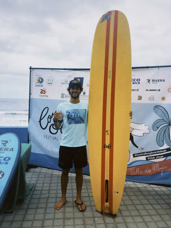 Dantas with a surfboard