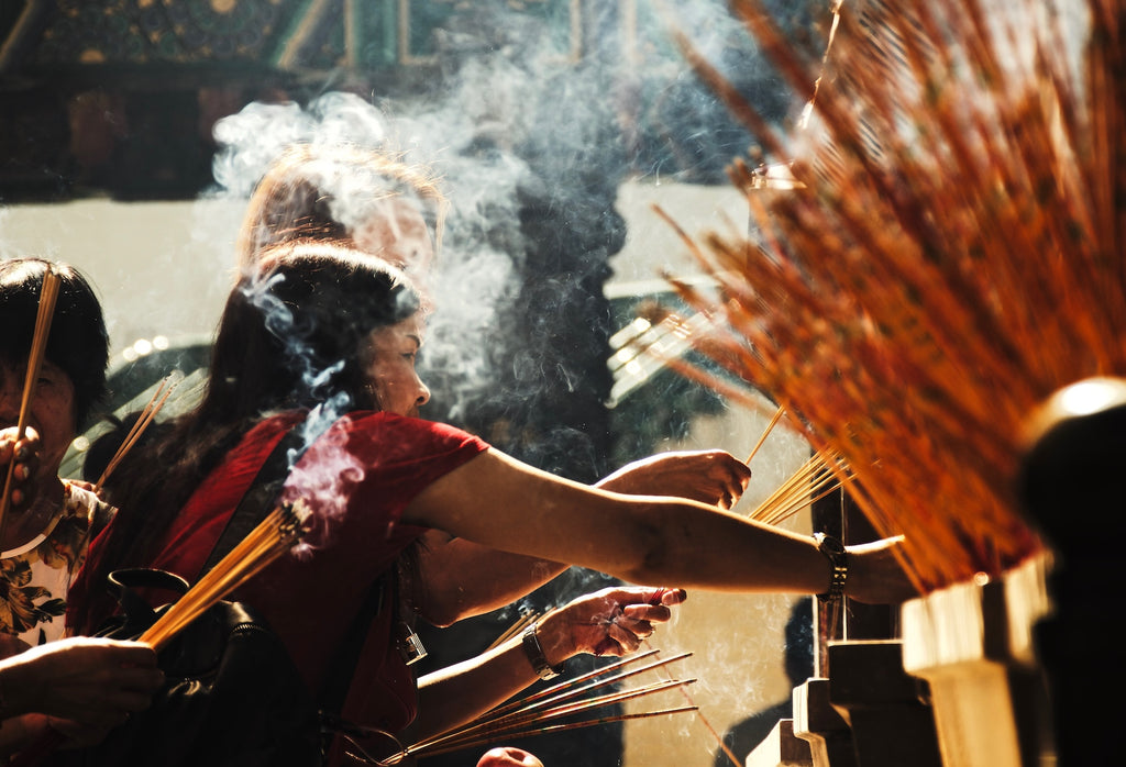 Incense sticks or agarbattis being used for worship