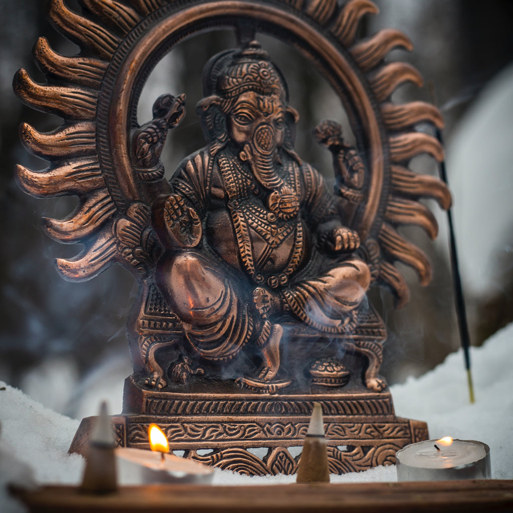 Dhoop incense being offered to lord ganesha