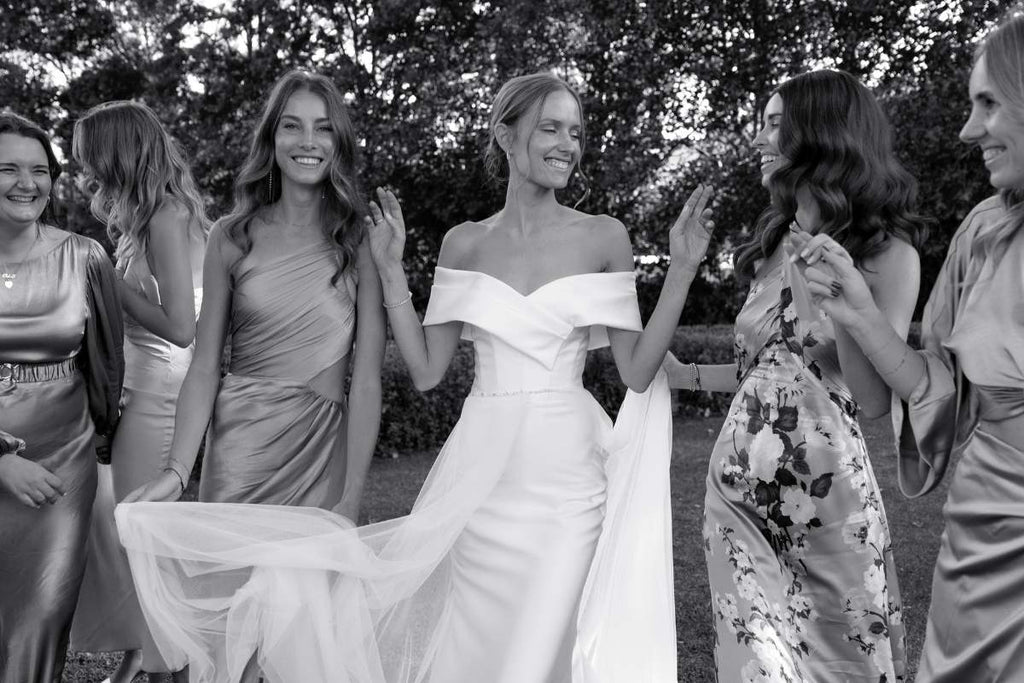 Bridesmaids with model bride, smiling beautiful women, wedding day, wedding dress