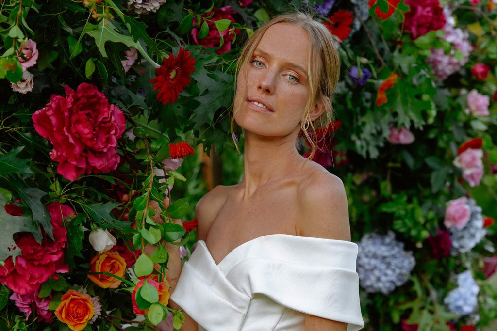 Bride with wedding arch flowers, model bride, beautiful woman