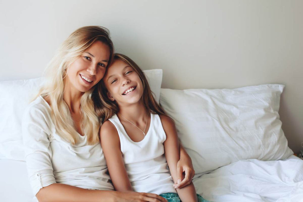 Blonde haired mom with her younger daughter, mother's day, celebrating mom, gifts for her