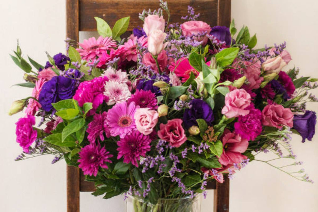 when flowers bloom, pink flowers, purple, blue, vase arrangement, loved ones, cape town