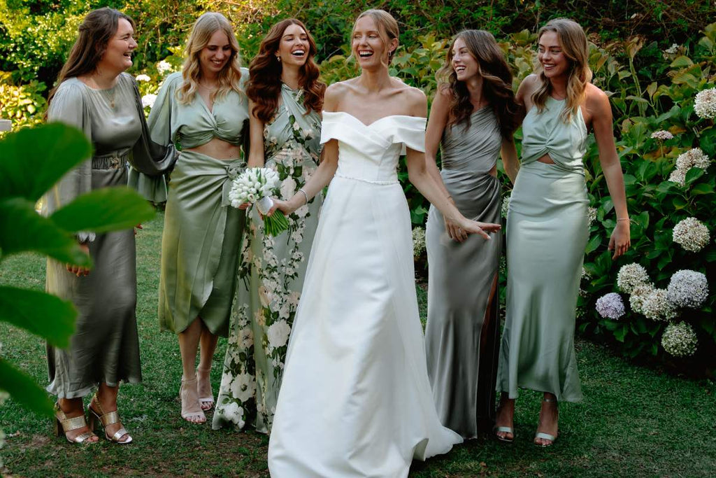 Beautiful Bride with her Bridesmaids, models, women smiling