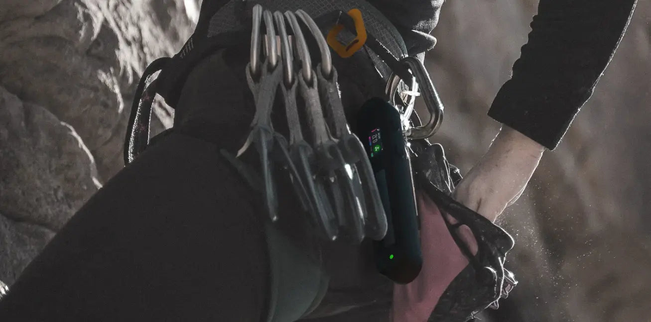 A person with a backpack stands outdoors, ready for an adventure.